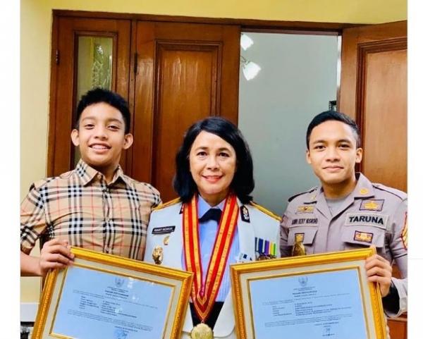 Raih Gelar Doktor, Polwan Ini Angkat Isu Kemanusiaan soal Korban Perdagangan Orang